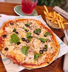 Chiken olive basil pizza